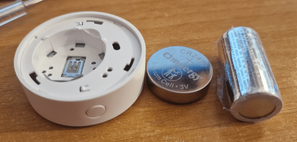 SNZB-02P with it's internal CR2477 battery and for comparison, a CR123 battery.