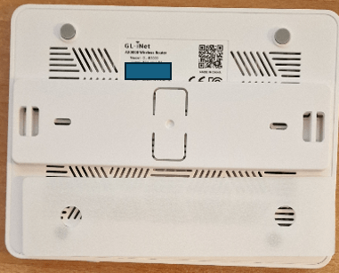 Underside of B300 router with ermoveable bracket and mounting guide